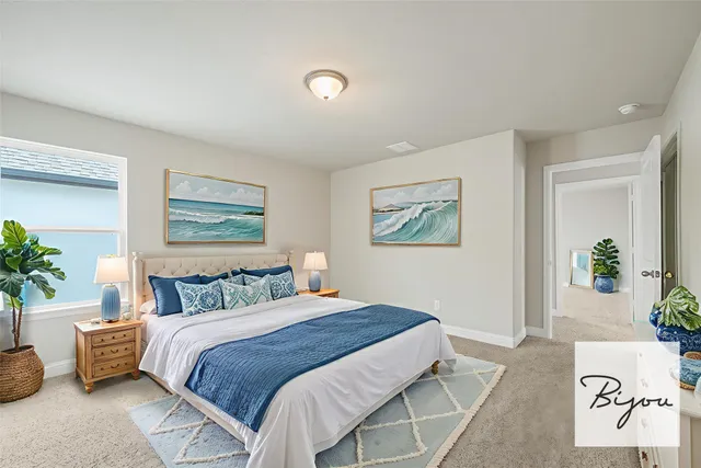 a dining room with furniture and a floor to ceiling window