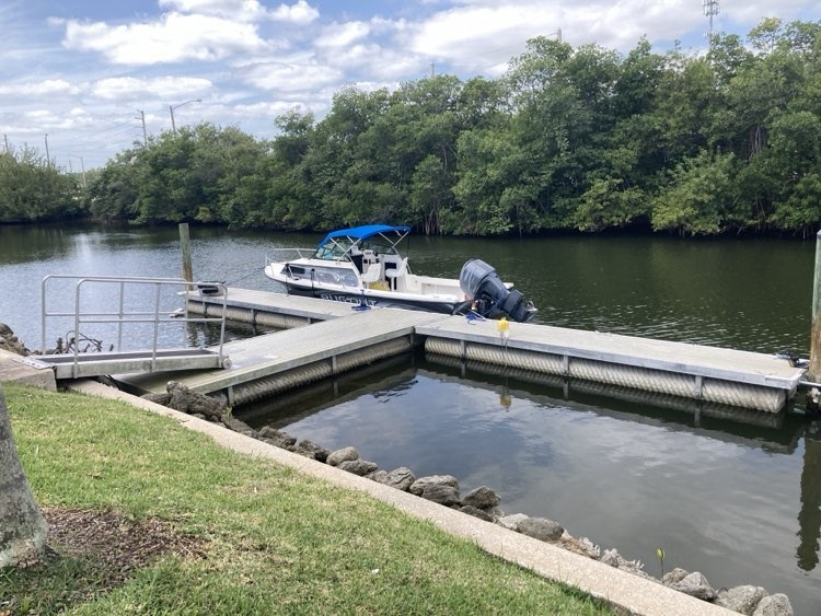 a view of a house with pool and a lake view