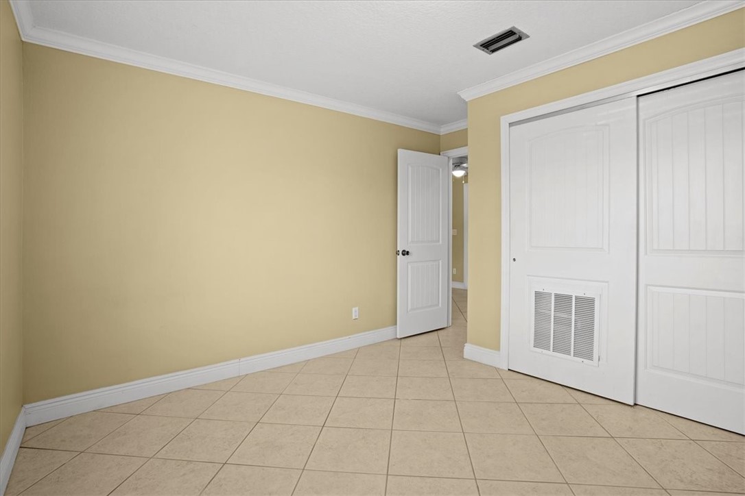1845 Robalo Drive, Unit 201D Vero Beach, FL 32960 - Photo 19 of 35 a view of an empty room