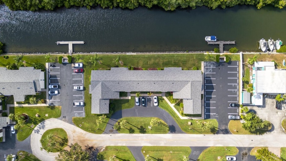 1845 Robalo Drive, Unit 201D Vero Beach, FL 32960 - Photo 33 of 35 an aerial view of a house with a swimming pool