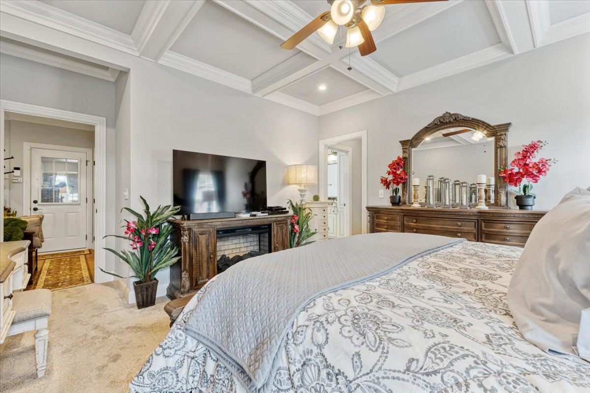 106 Riley Creek Road Tullahoma, TN 37388 - Photo 11 of 25 a bedroom with a bed and a flat screen tv