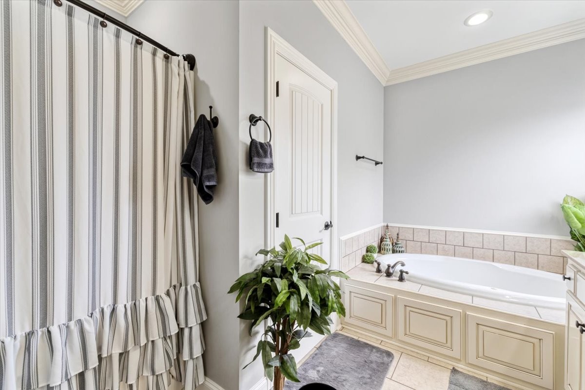 106 Riley Creek Road Tullahoma, TN 37388 - Photo 12 of 25 a white bath tub sitting next to a white sink