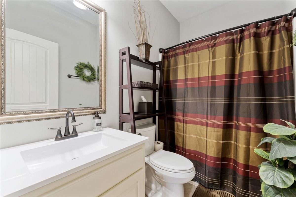 106 Riley Creek Road Tullahoma, TN 37388 - Photo 15 of 25 a bathroom with a sink toilet and shower