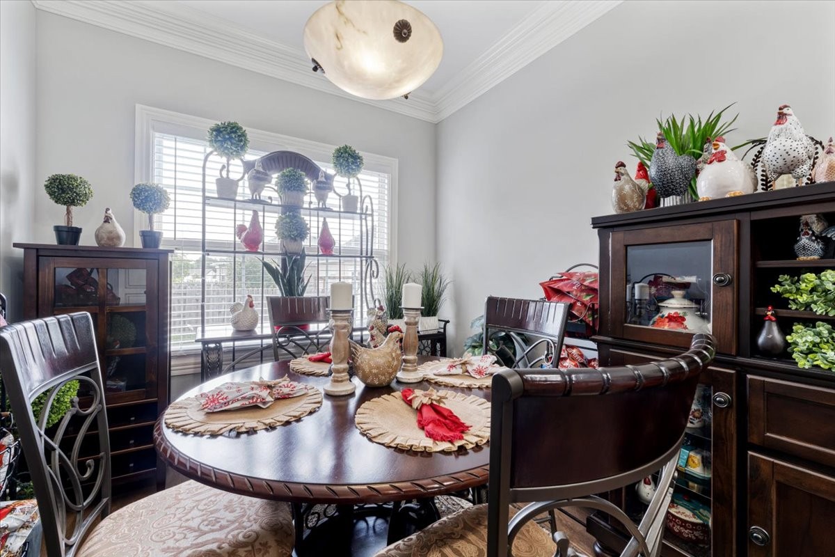 106 Riley Creek Road Tullahoma, TN 37388 - Photo 9 of 25 a view of a dining room with furniture and chandelier