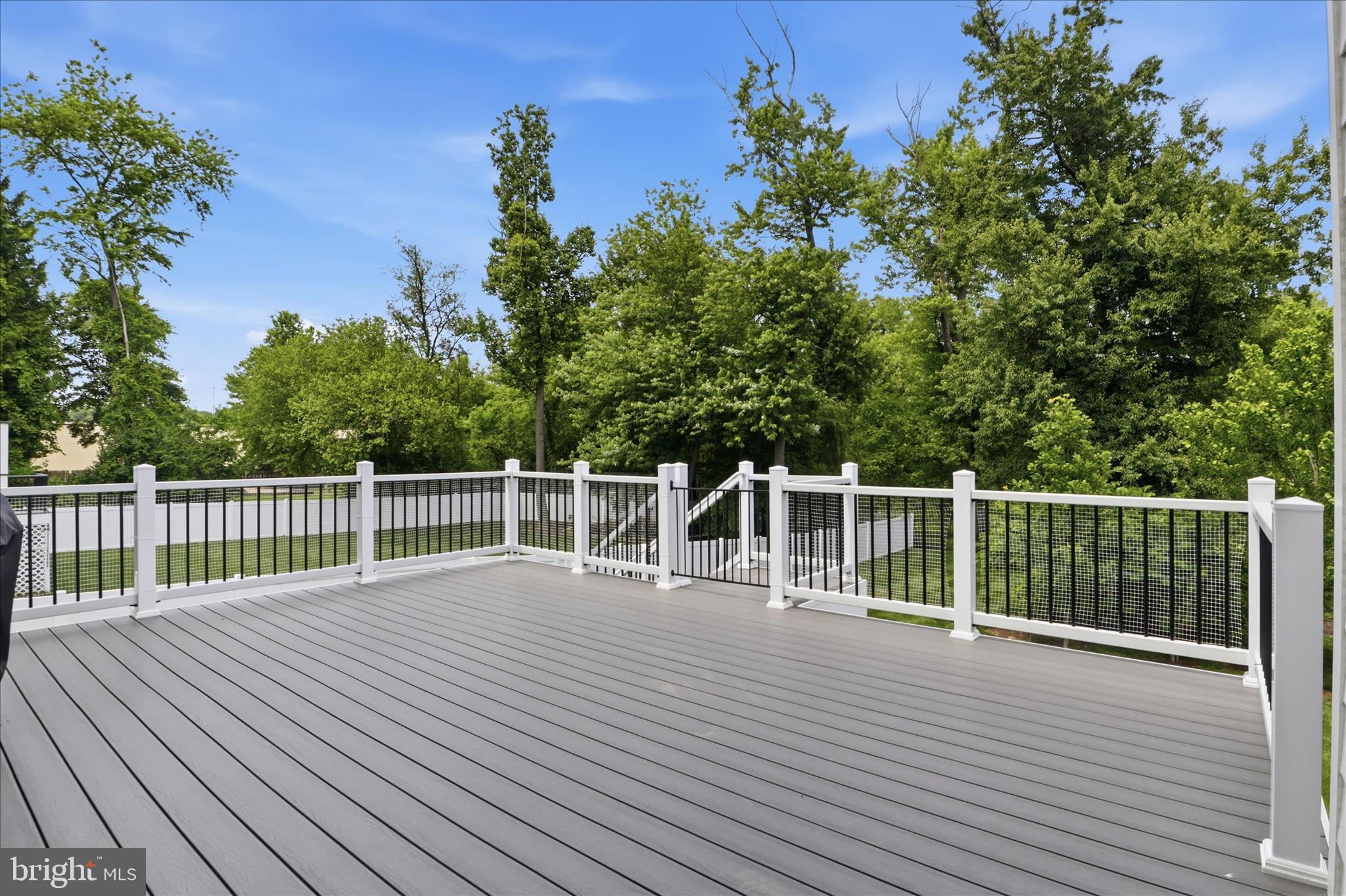 202 Branch Road Southeast Vienna, VA 22180 - Photo 14 of 59 a balcony with view of trees in the background