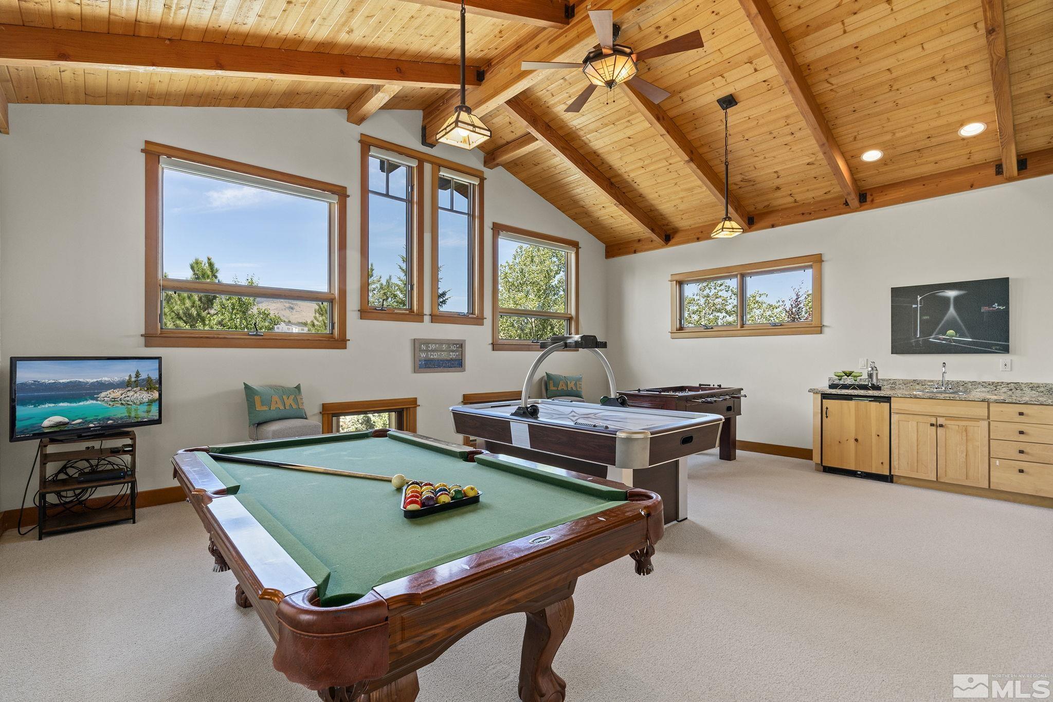 7035 Quail Rock Lane Reno, NV 89511 - Photo 26 of 37 a room with furniture and window