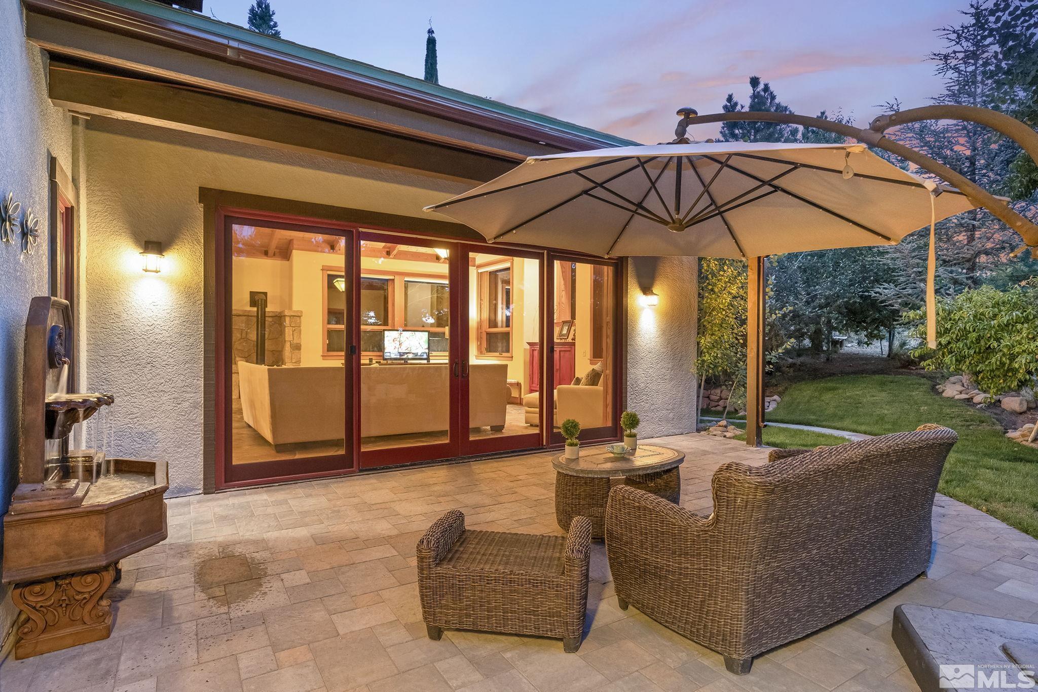 7035 Quail Rock Lane Reno, NV 89511 - Photo 29 of 37 a outdoor living space with furniture and garden view