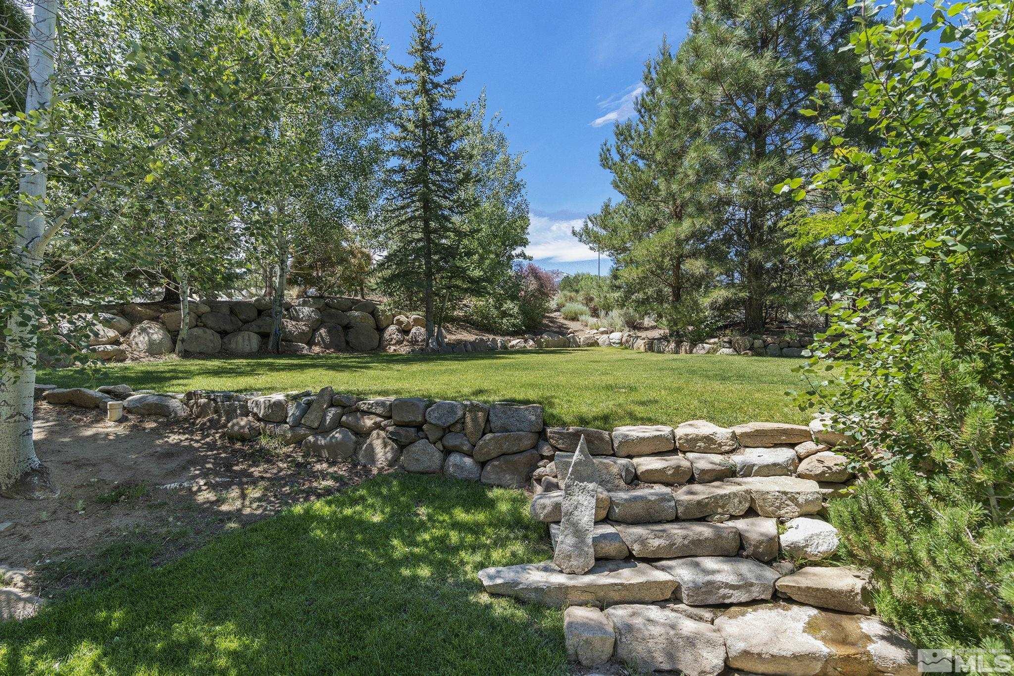 7035 Quail Rock Lane Reno, NV 89511 - Photo 32 of 37 a view of a green field