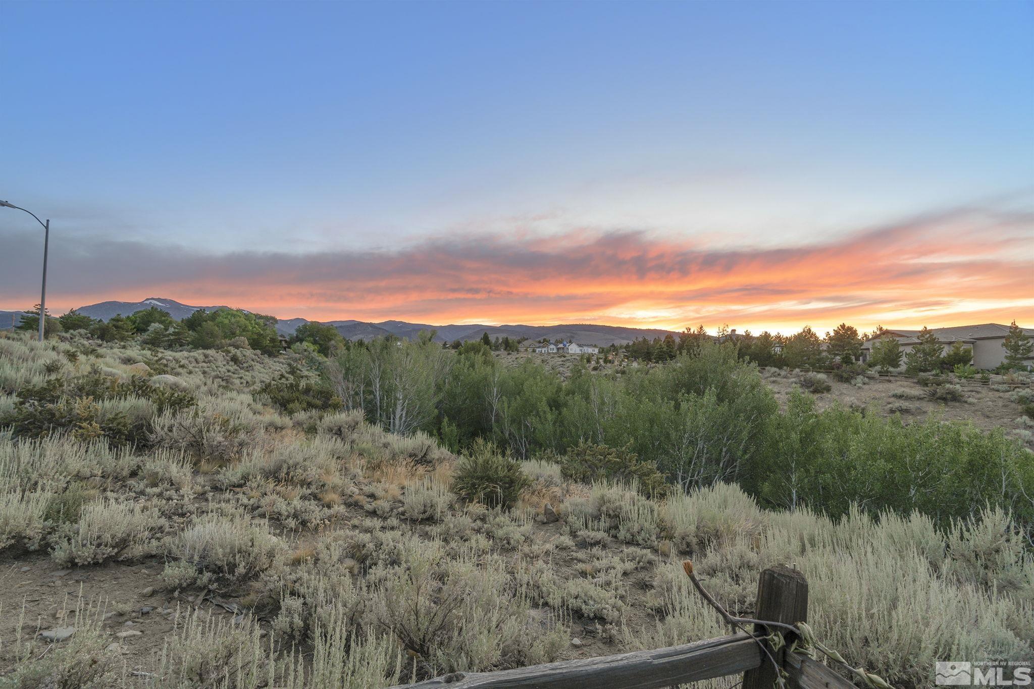 7035 Quail Rock Lane Reno, NV 89511 - Photo 34 of 37 a view of a city with lush green forest