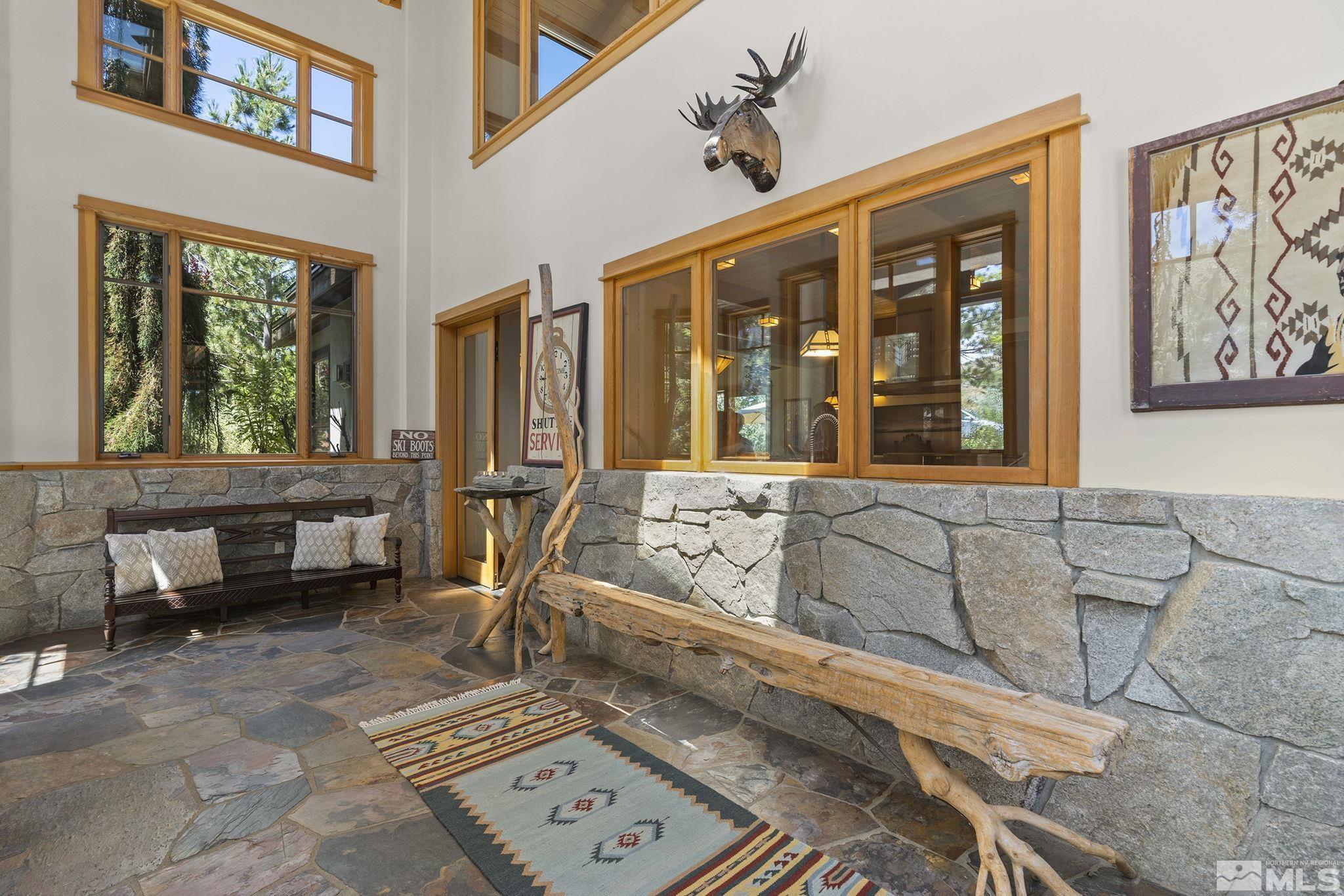 7035 Quail Rock Lane Reno, NV 89511 - Photo 6 of 37 a living room with furniture and a window