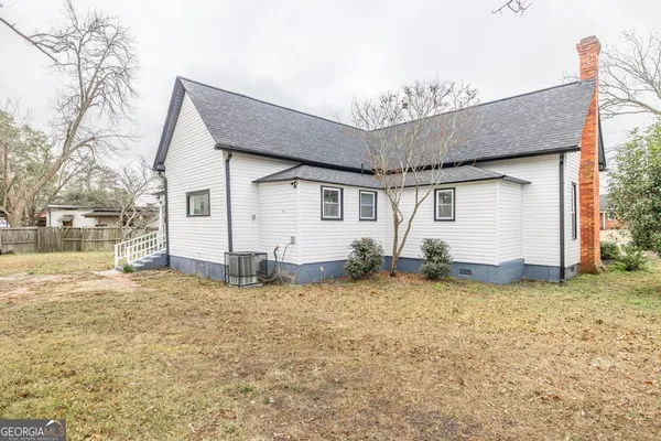 a view of a house with porch and wooden floor