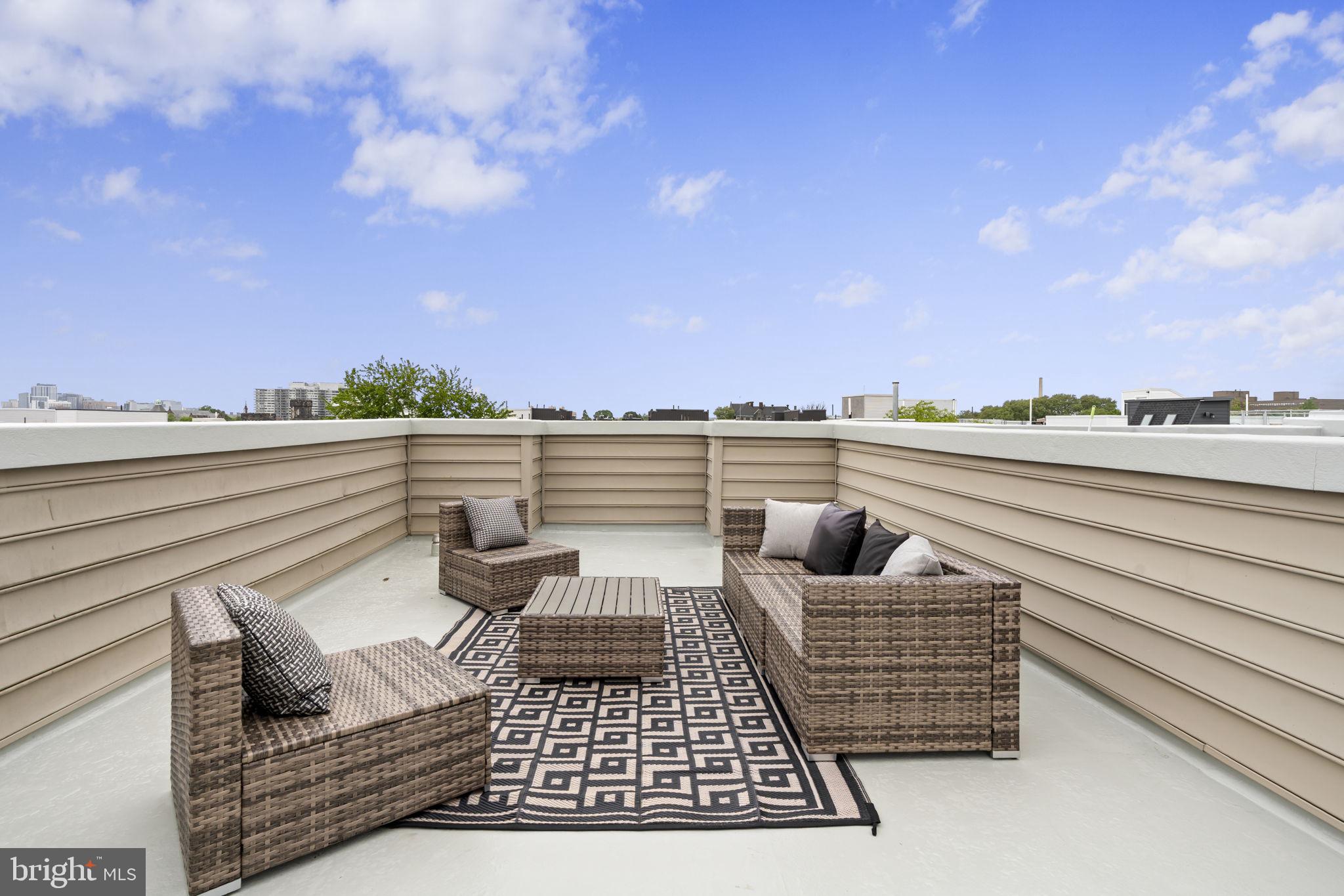 751 North Uber Street, Unit 3 Philadelphia, PA 19130 - Photo 32 of 36 Stylish rooftop retreat with skyline views.