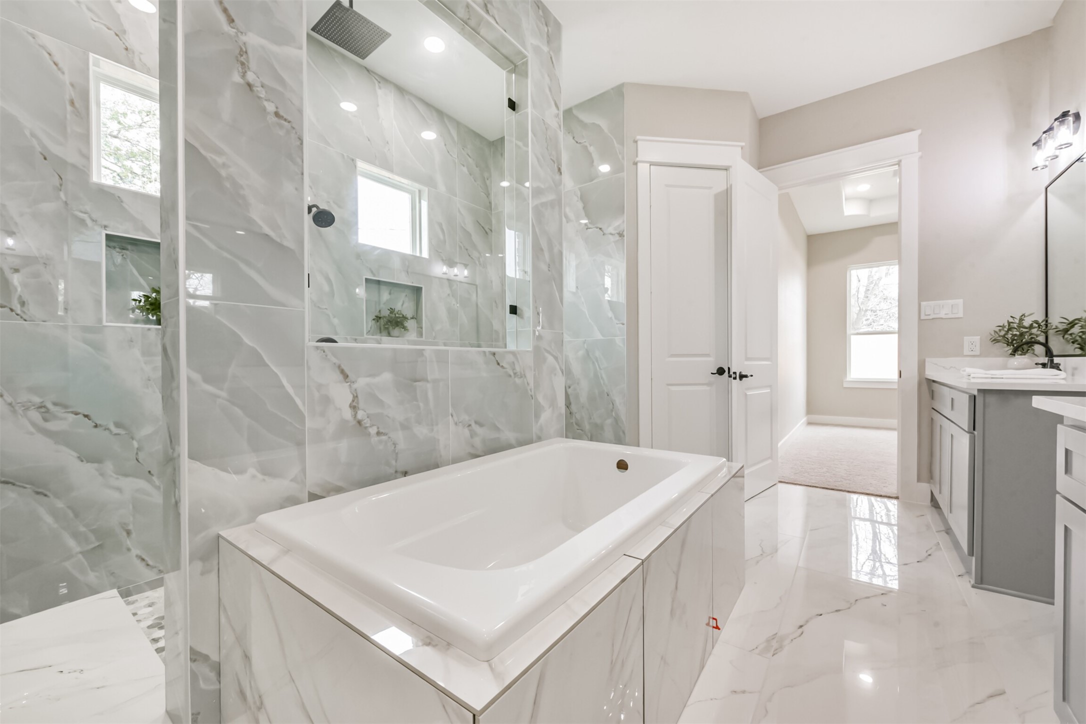 2803 Lancaster Lane Pasadena, TX 77506 - Photo 27 of 45 a bathroom with a tub a sink and a shower
