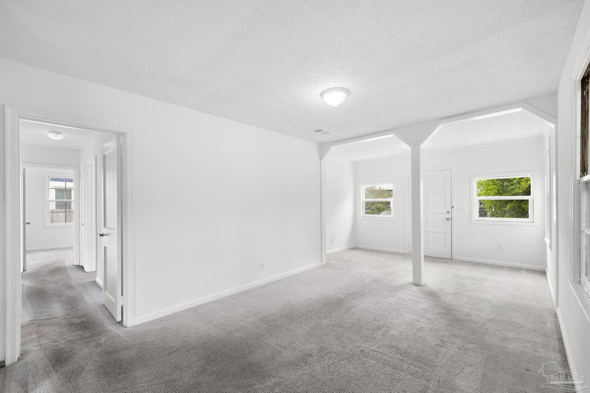 208 Berry Road Pensacola, FL 32507 - Photo 12 of 41 an empty room with windows and closet