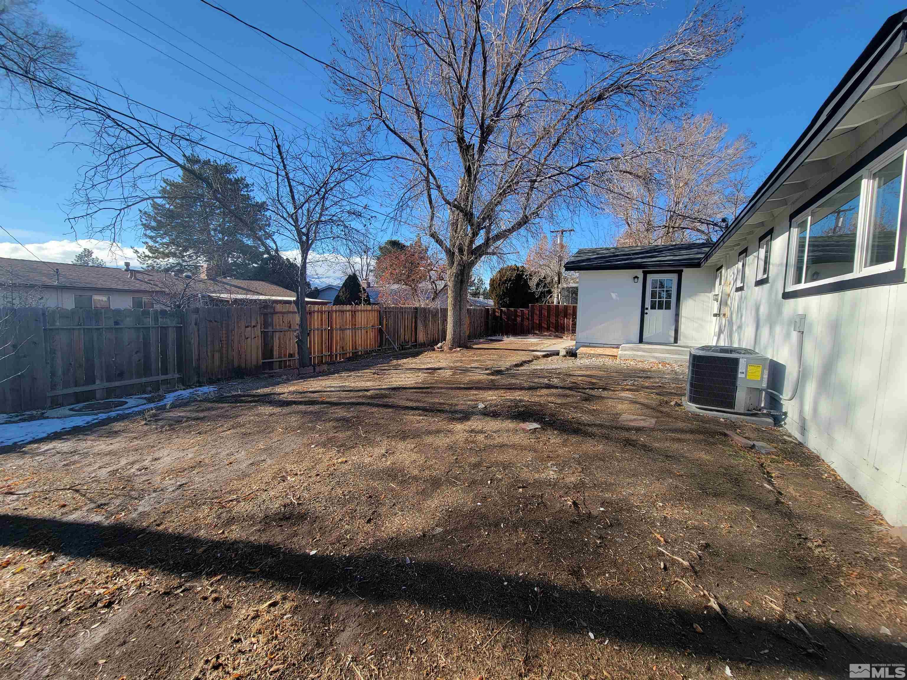 1920 West 7th Street Reno, NV 89503 - Photo 19 of 23 a view of a yard with a large tree