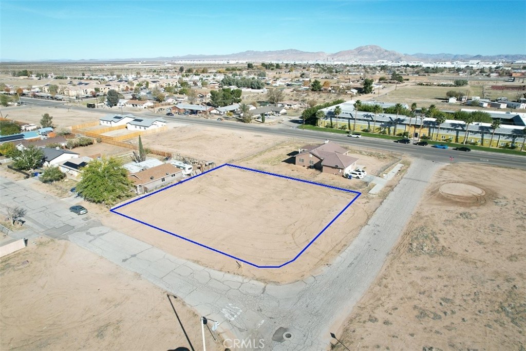 2 Hardy Adelanto, CA 92301 - Photo 3 of 26 an aerial view of residential houses with outdoor space