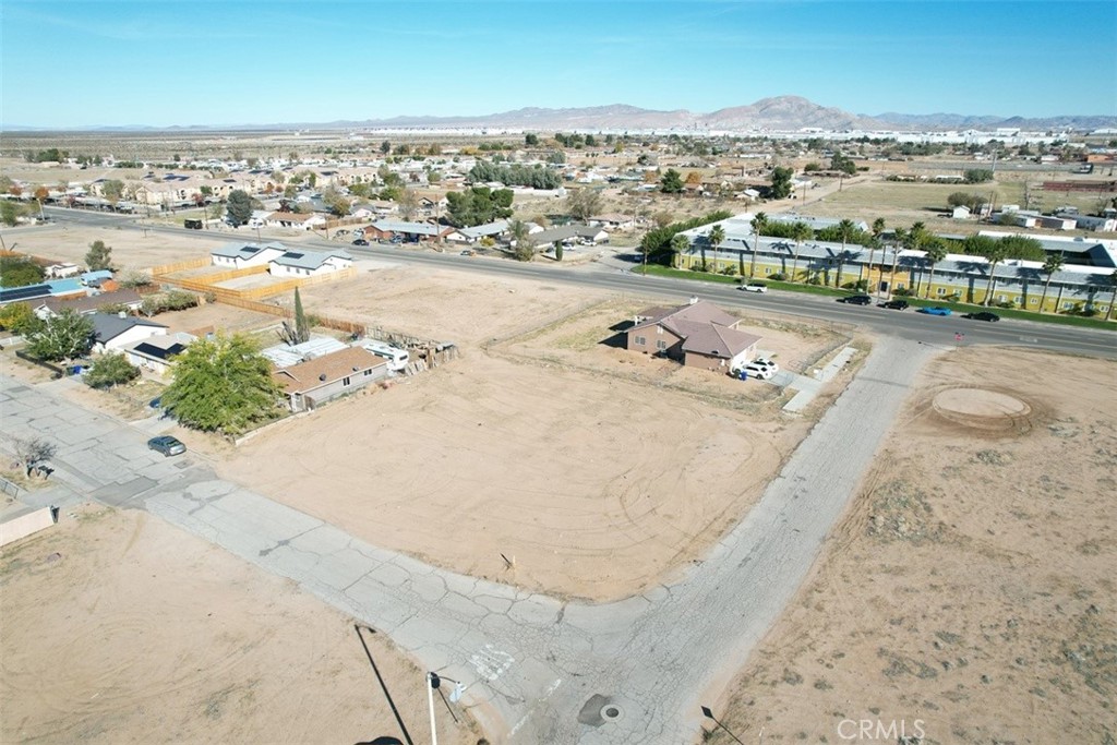 2 Hardy Adelanto, CA 92301 - Photo 4 of 26 an aerial view of residential houses with outdoor space