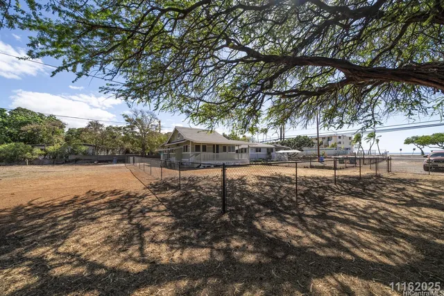 a backyard of a house with lots of green space