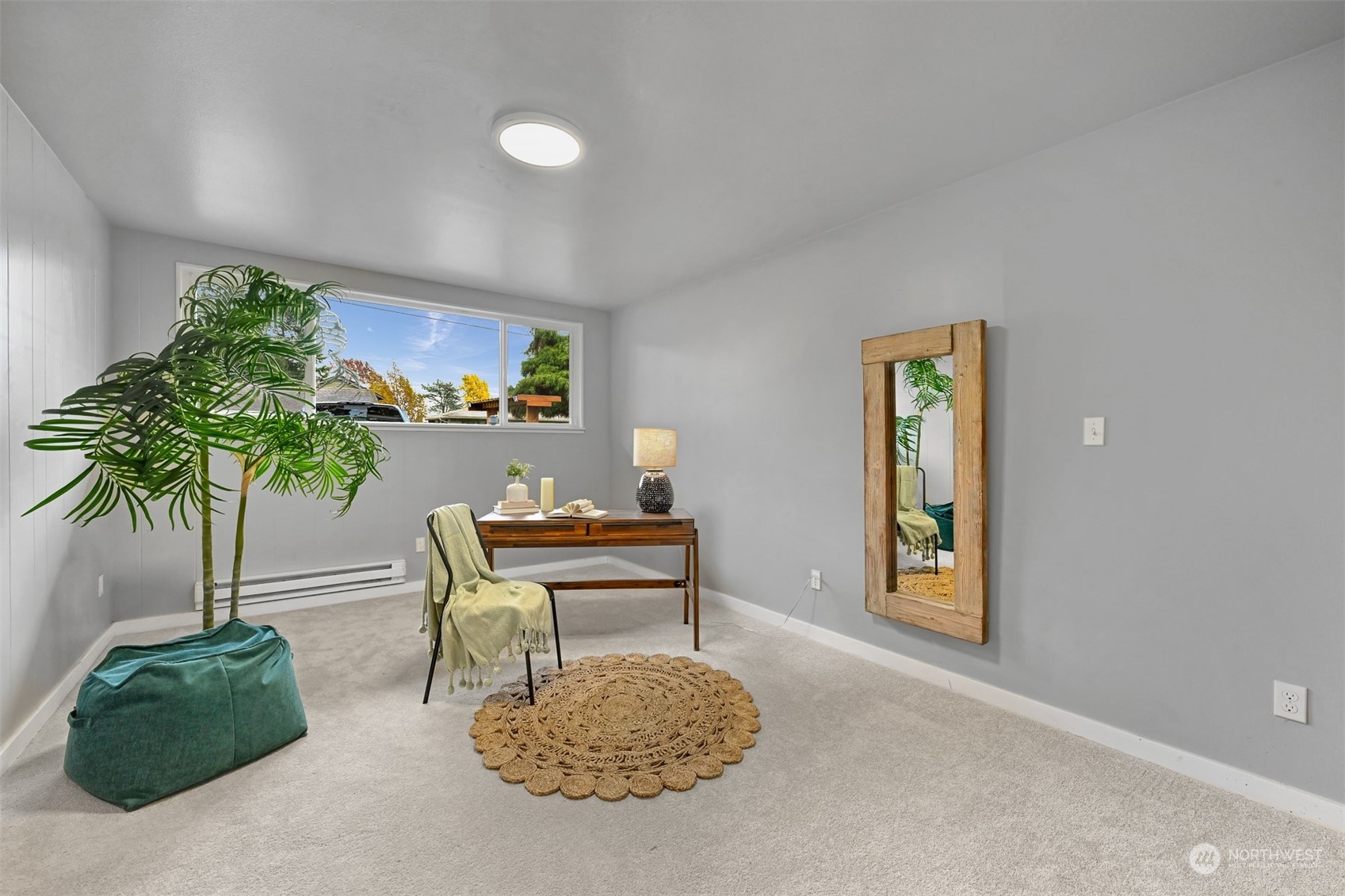 2907 Lynn Street Bellingham, WA 98225 - Photo 18 of 40 a living room with furniture and a potted plant