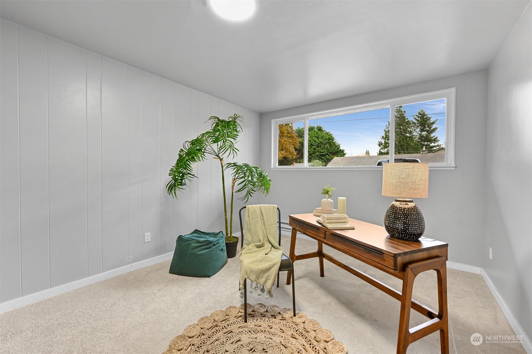 2907 Lynn Street Bellingham, WA 98225 - Photo 19 of 40 a living room with furniture and a potted plant