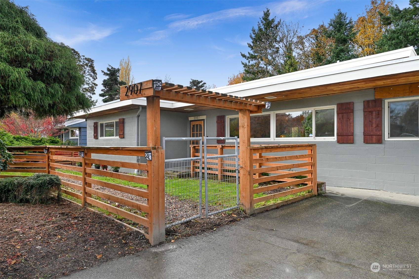 2907 Lynn Street Bellingham, WA 98225 - Photo 2 of 40 a view of a house with a yard and wooden fence