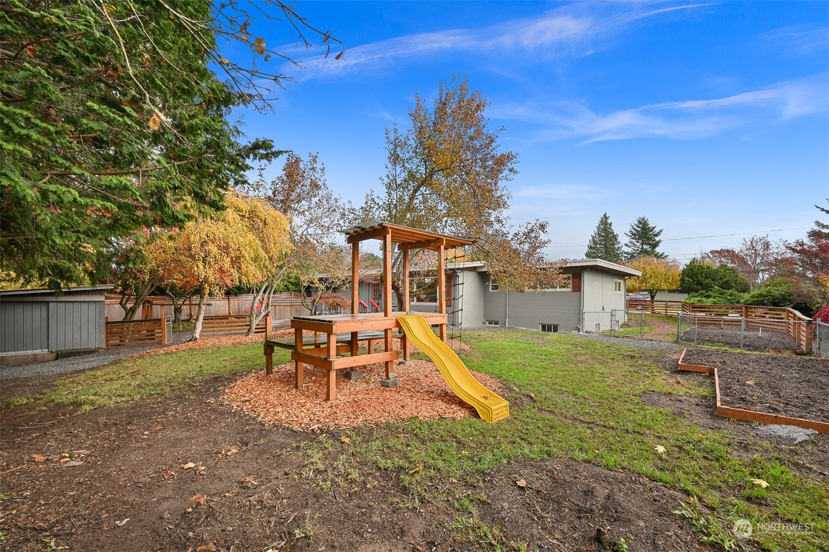 2907 Lynn Street Bellingham, WA 98225 - Photo 28 of 40 a view of a house with backyard and a tree