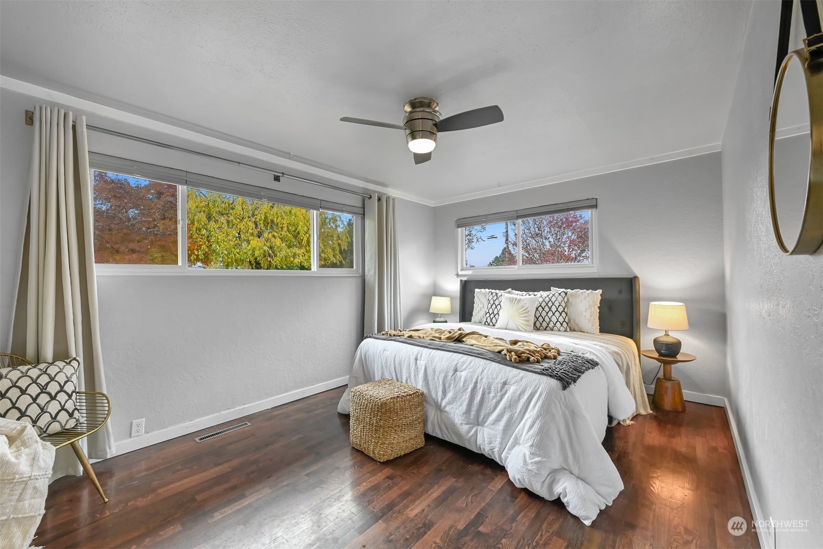2907 Lynn Street Bellingham, WA 98225 - Photo 7 of 40 a bedroom with a bed and wooden floor