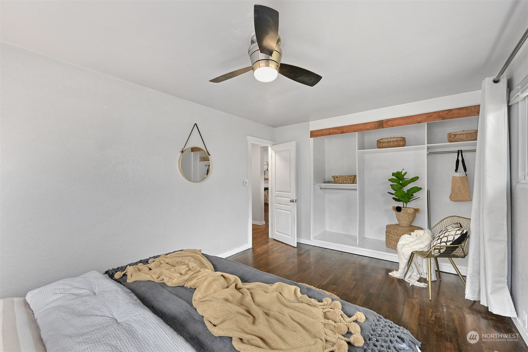 2907 Lynn Street Bellingham, WA 98225 - Photo 8 of 40 a bedroom with a bed and a chandelier