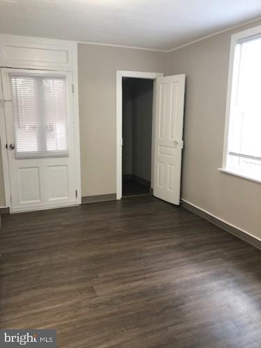 620 Frederick Street Hanover, PA 17331 - Photo 4 of 9 an empty room with wooden floor and windows