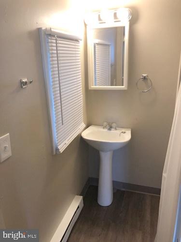 620 Frederick Street Hanover, PA 17331 - Photo 5 of 9 a bathroom with a sink a mirror and a window