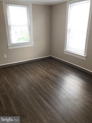 620 Frederick Street Hanover, PA 17331 - Photo 7 of 9 an empty room with wooden floor and windows