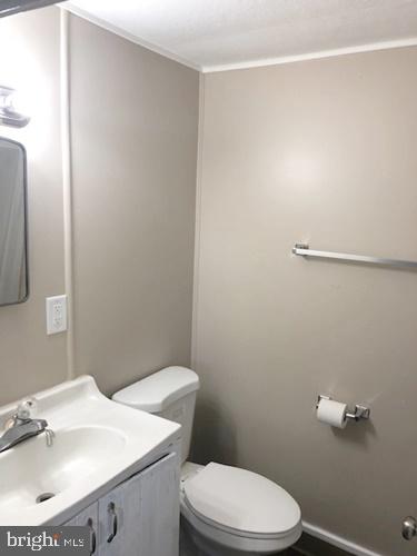 620 Frederick Street Hanover, PA 17331 - Photo 9 of 9 a bathroom with a sink a toilet and mirror