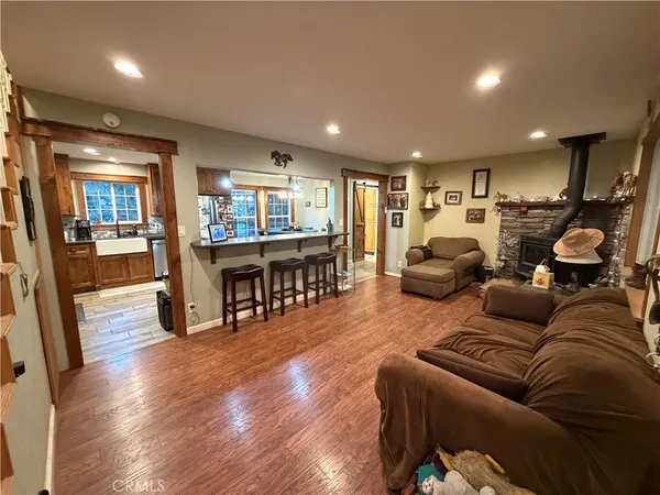 a bedroom with furniture and windows