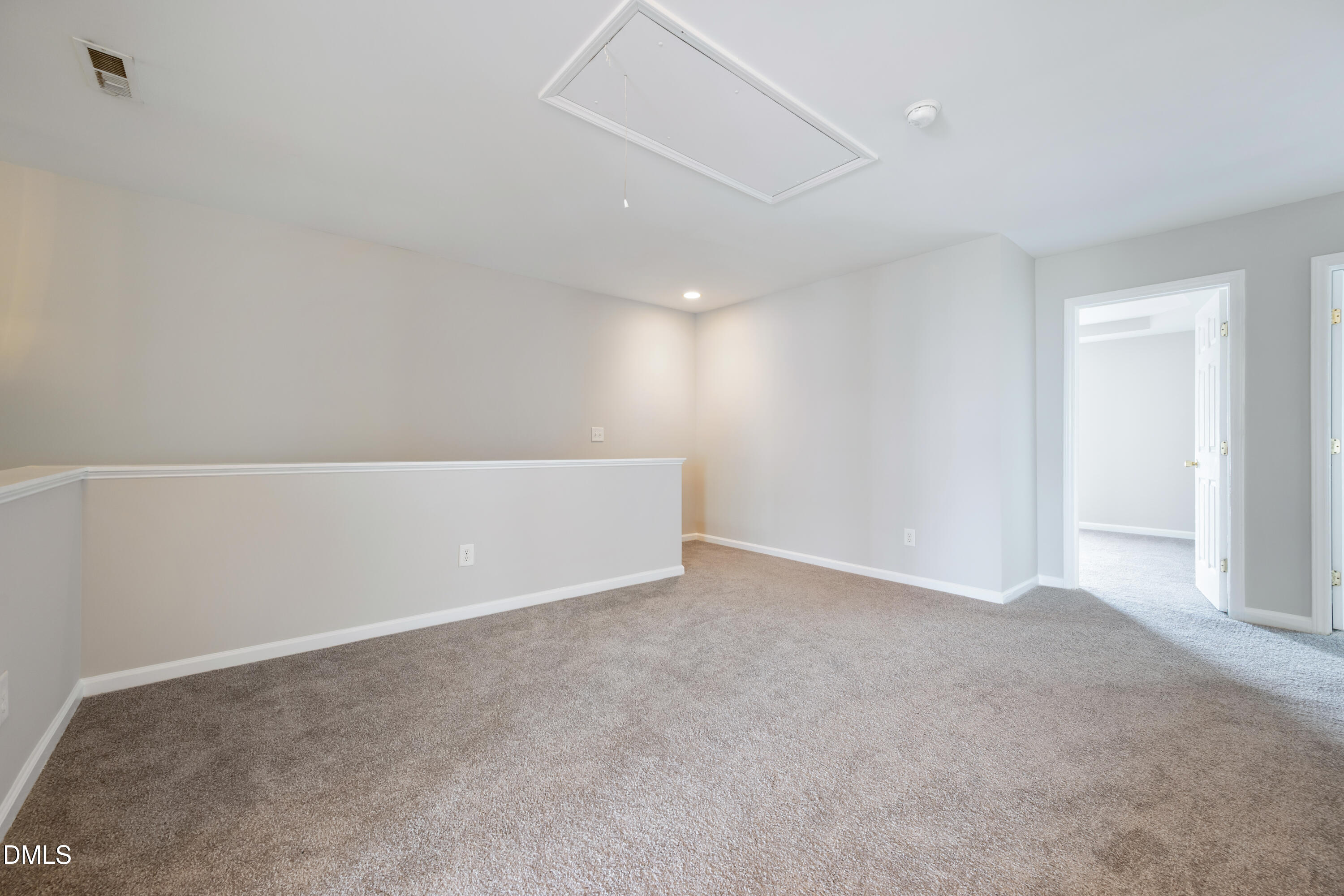 1532 Pebble Ridge Drive Raleigh, NC 27610 - Photo 23 of 40 a view of an empty room