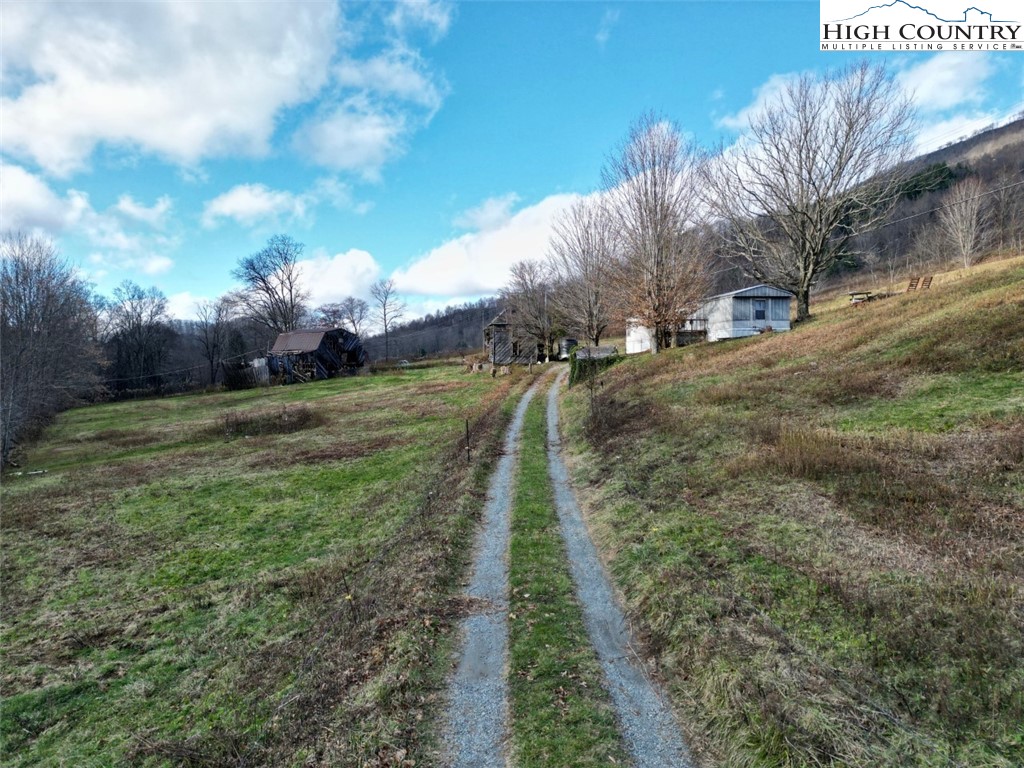 337-339 Greer Lane Vilas, NC 28692 - Photo 11 of 11 a view of a pathway with a yard