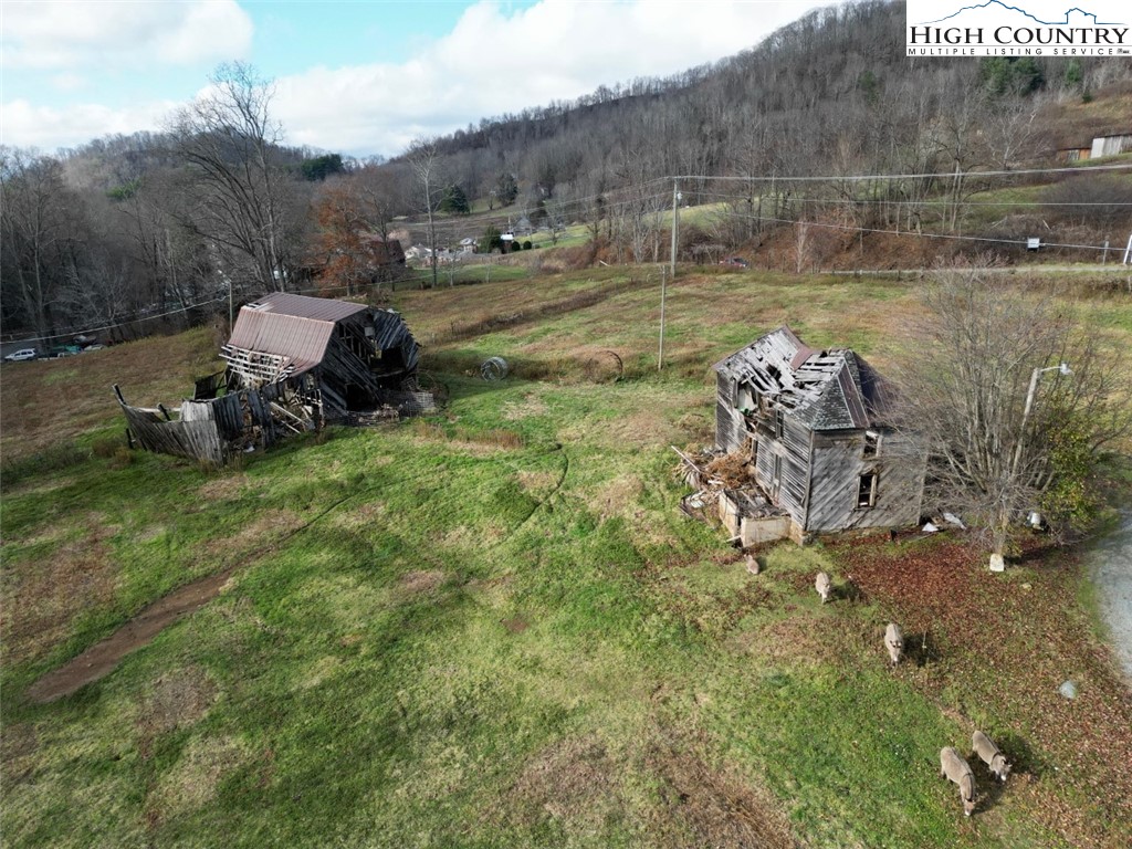337-339 Greer Lane Vilas, NC 28692 - Photo 5 of 11 a backyard of a house with lots of green space