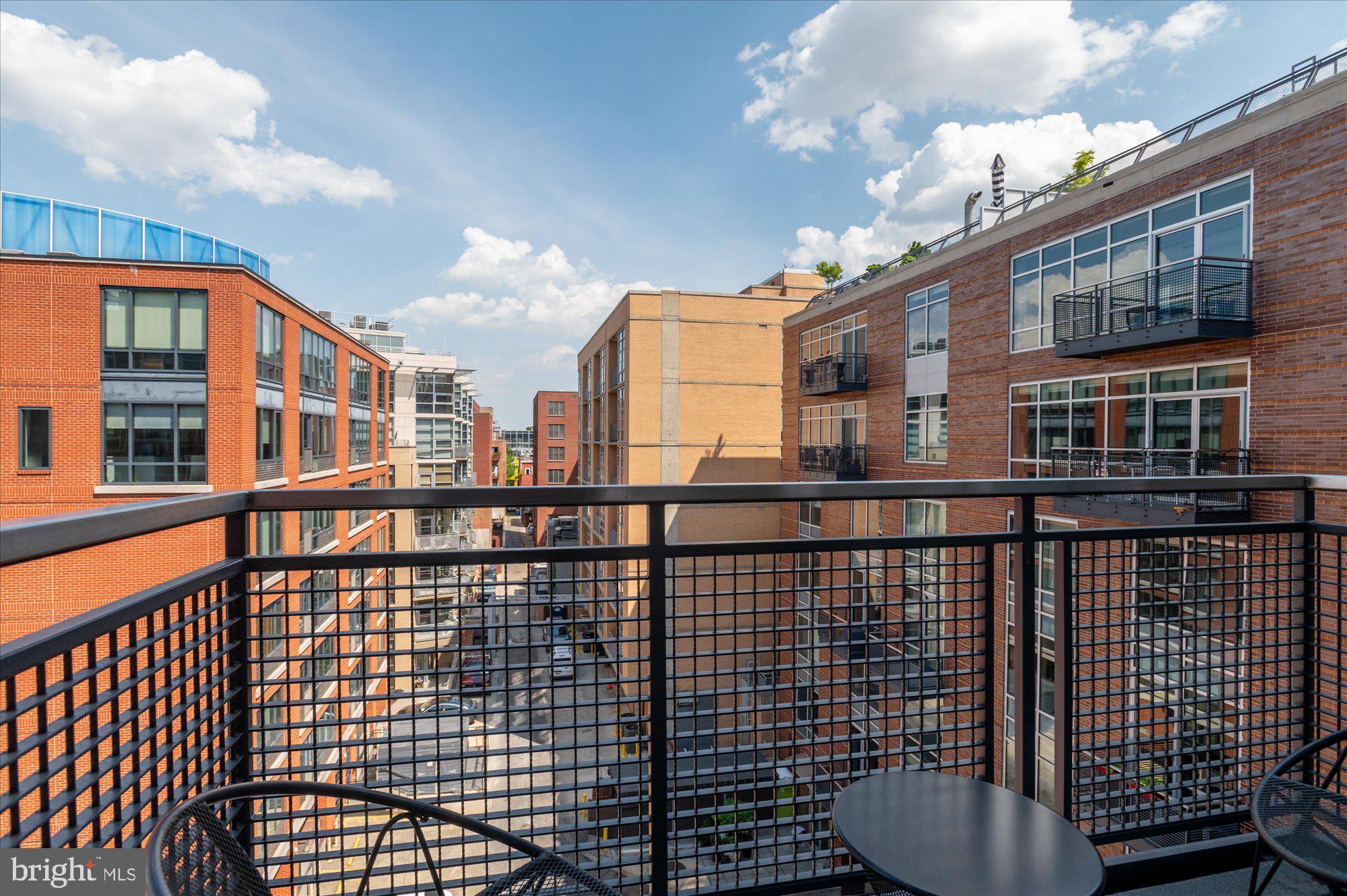 1515 15th Street Northwest, Unit 602 Washington, DC 20005 - Photo 17 of 30 a view of a building from a balcony