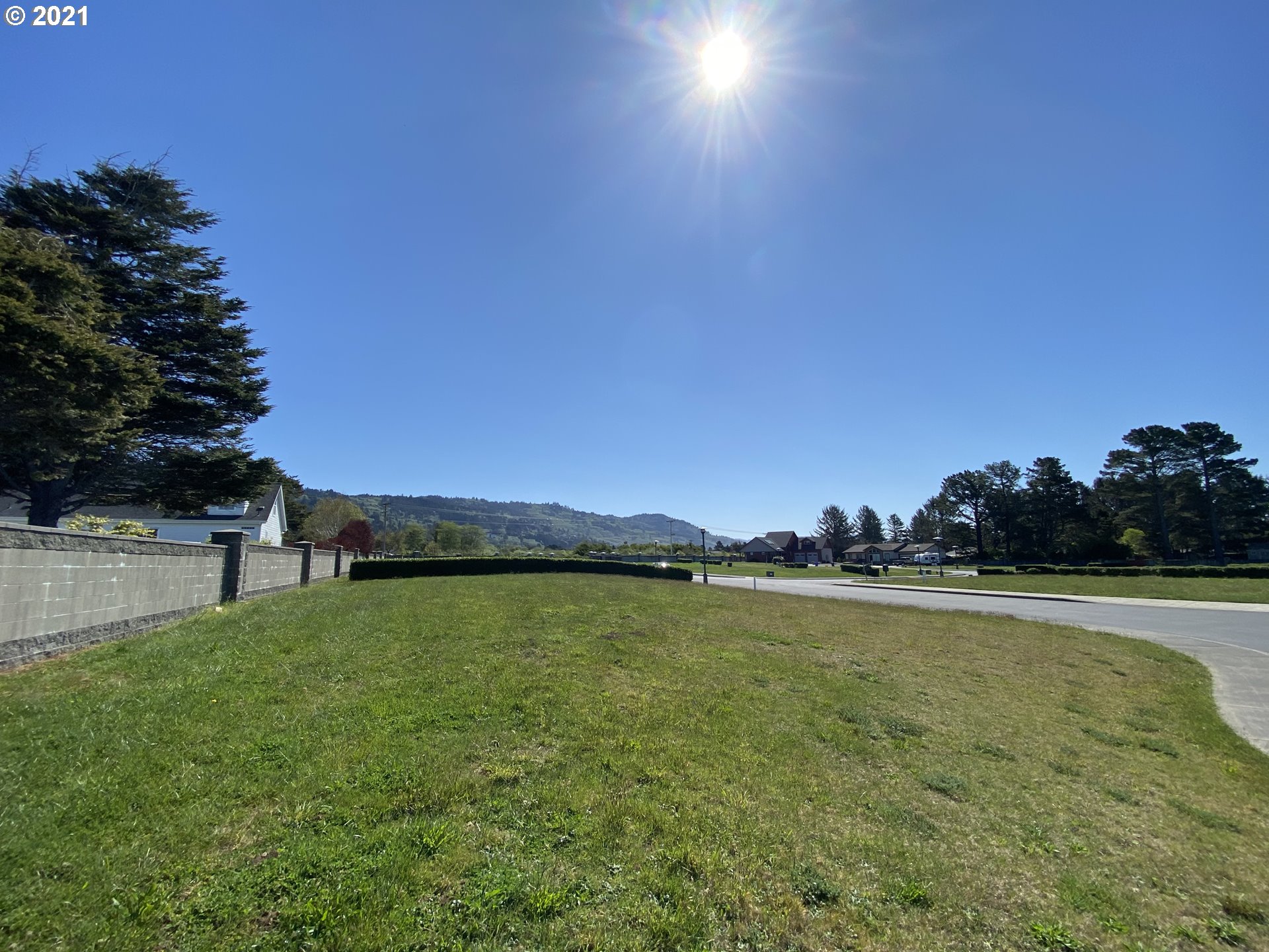 Sea Court Lane, Unit 3 Brookings, OR 97415 - Photo 8 of 20 a view of a lake and sunset