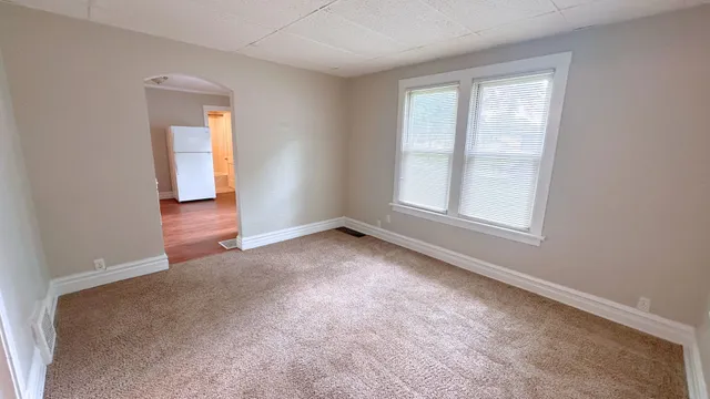 an empty room with windows