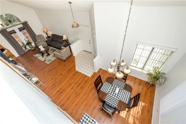 a bedroom with a bed and lamp