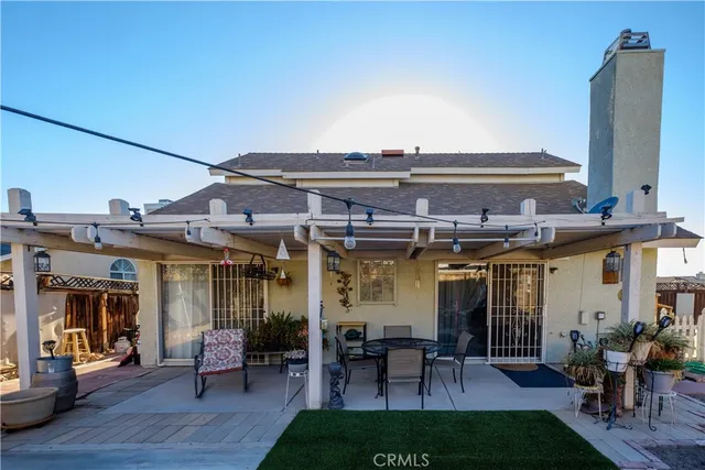 a view of a cafe with sitting area
