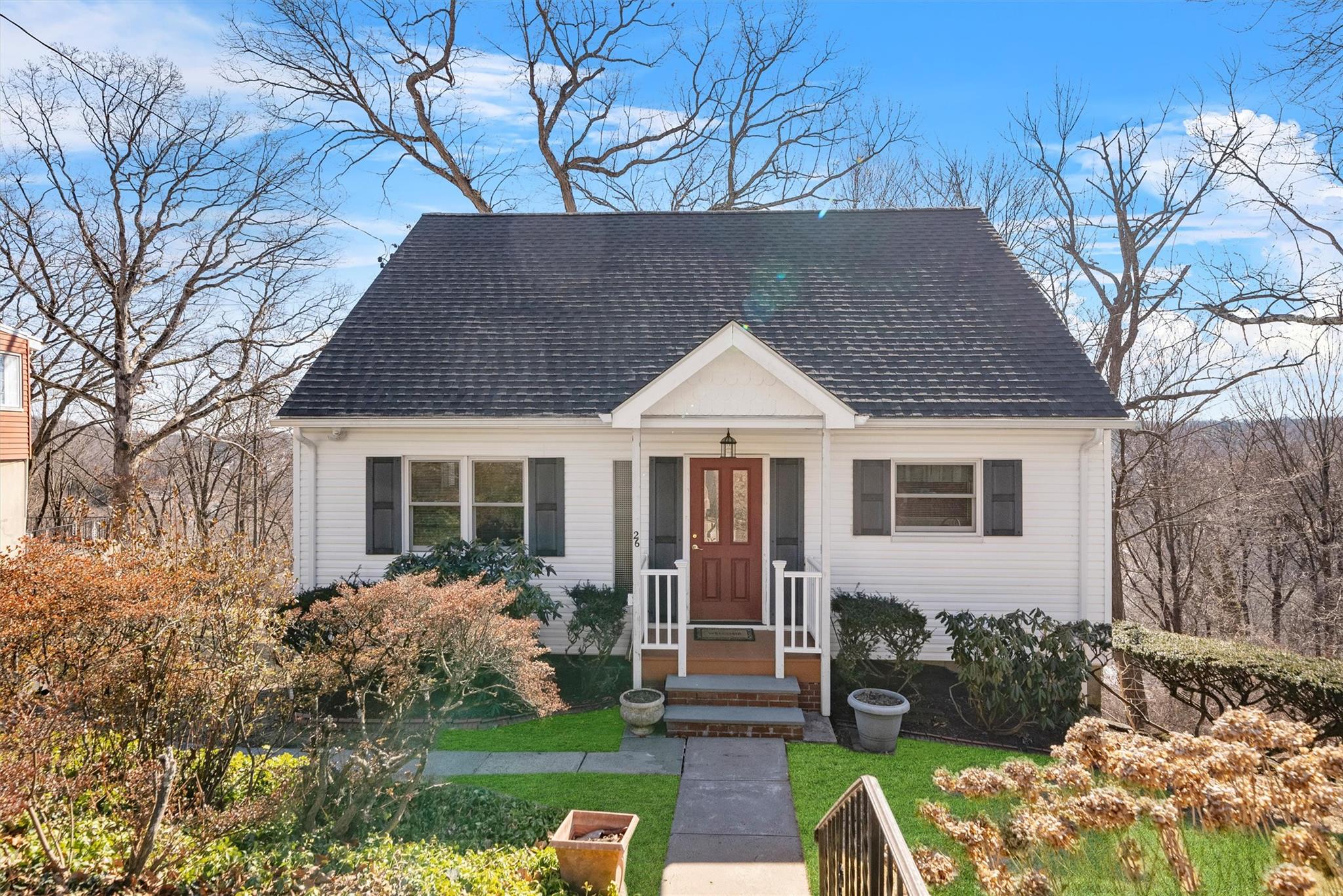 26 Prospect Avenue Valhalla, NY 10595 - Photo 1 of 1 a front view of a house with a yard