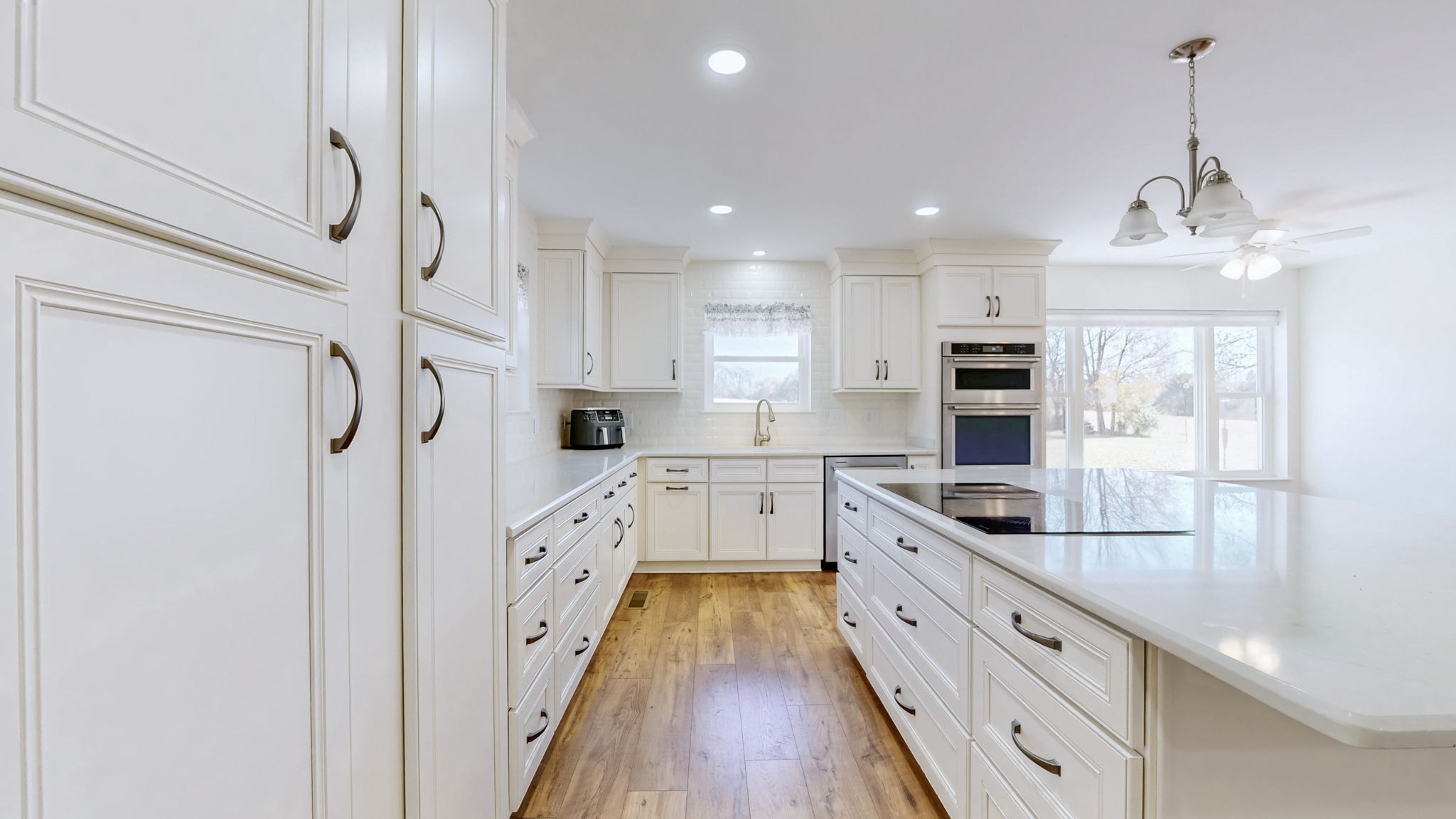 120 3 Fork Bridge Road Wartrace, TN 37183 - Photo 11 of 48 a kitchen with white cabinets and stainless steel appliances