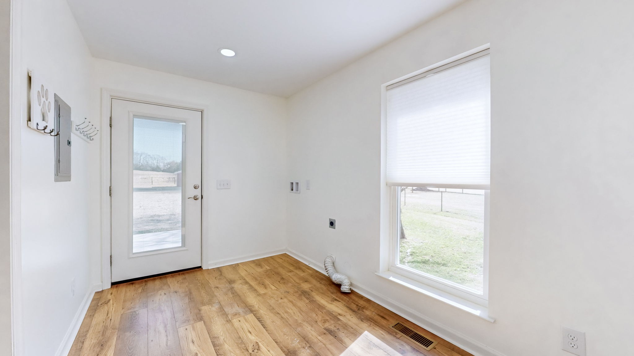 120 3 Fork Bridge Road Wartrace, TN 37183 - Photo 15 of 48 an empty room with wooden floor and windows