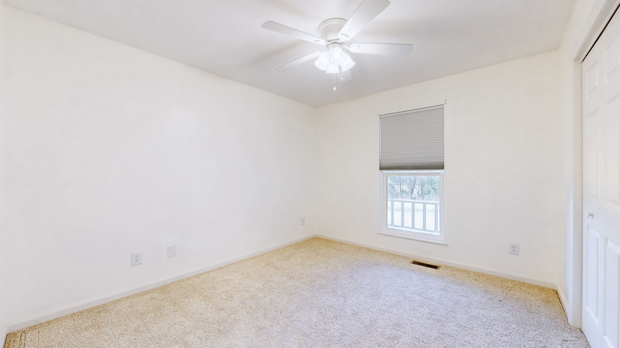120 3 Fork Bridge Road Wartrace, TN 37183 - Photo 22 of 48 an empty room with windows and ceiling fan