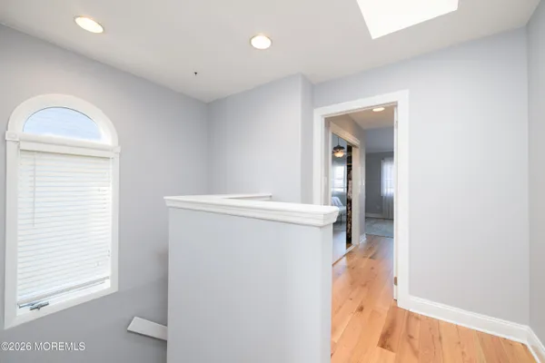 a view of walk in closet with window