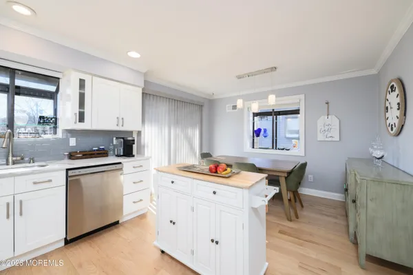 a kitchen that has a cabinets and a stove
