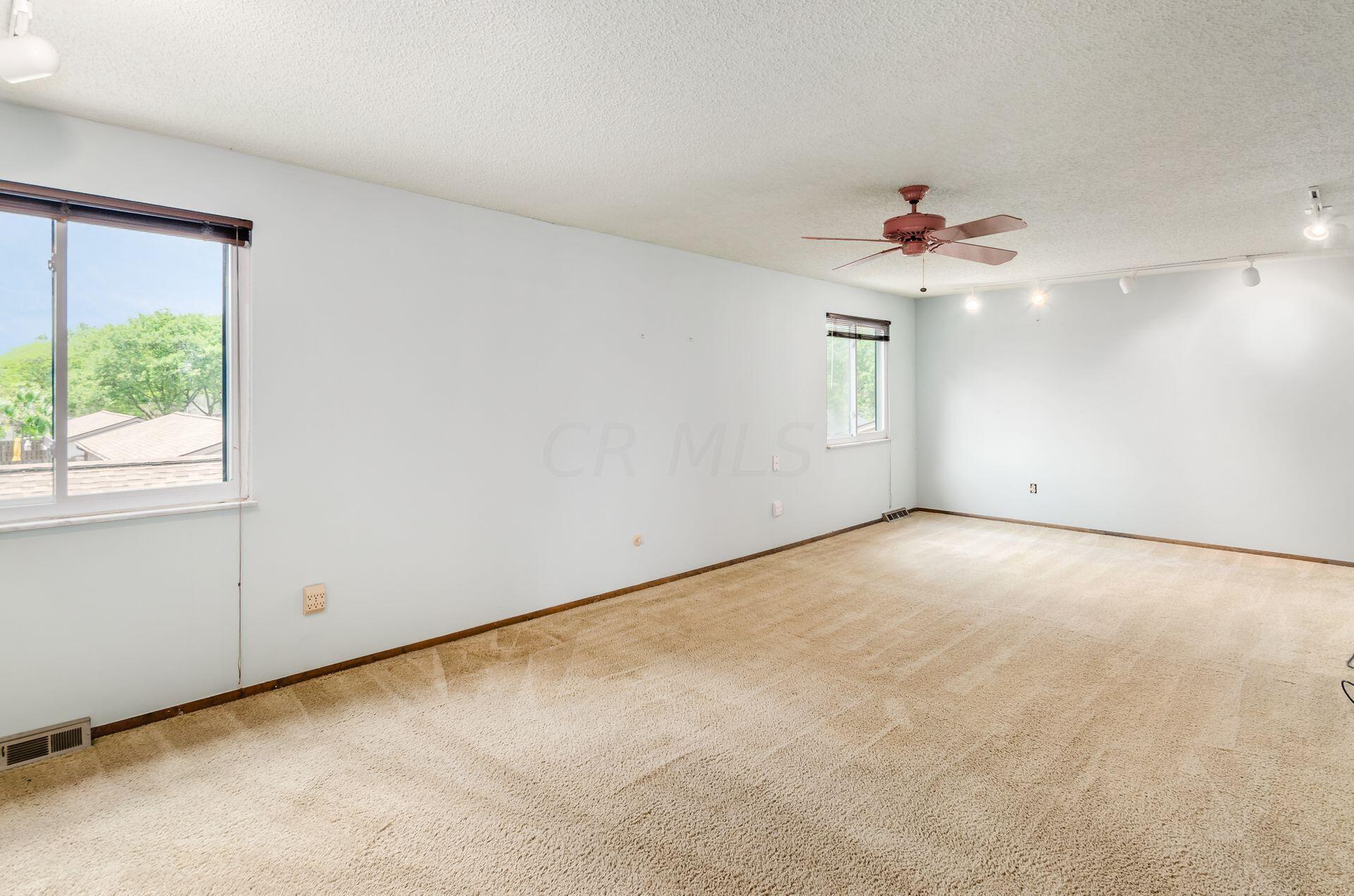 6283 Rutherford Place, Unit A Columbus, OH 43213 - Photo 13 of 33 Neutral Carpet (professionally cleaned May 23, 2024) - Neutral colored Walls - New Insualted Windows