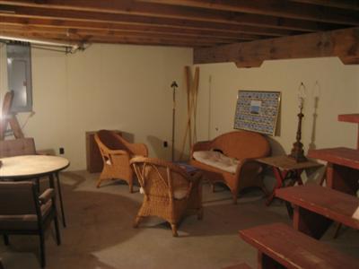 120 Pine Needle Road Wellfleet, MA 02667 - Photo 11 of 15 a view of a room that has a table and chairs in it