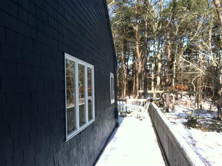 120 Pine Needle Road Wellfleet, MA 02667 - Photo 5 of 15 a view of a balcony with chairs